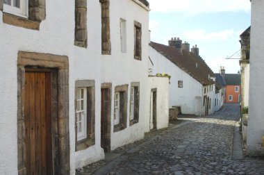 Medieval cobbled street in Culross, fife clipart