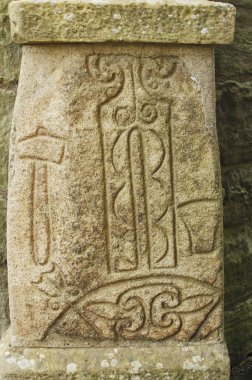 Ancient carved Pictish stone clipart
