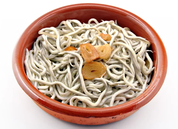Eels in garlic — Stock Photo, Image