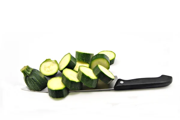 Zucchini with a knife — Stock Photo, Image