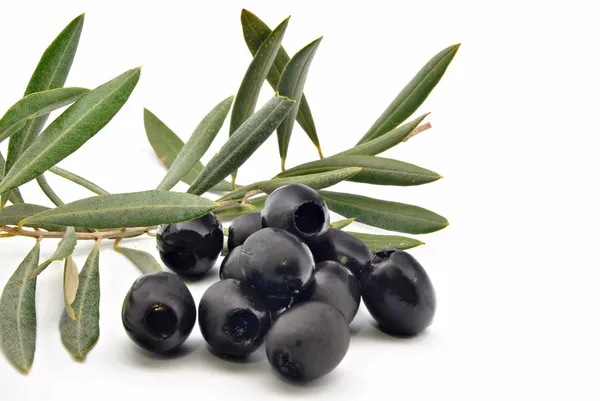 stock image Black olives with olive leaves