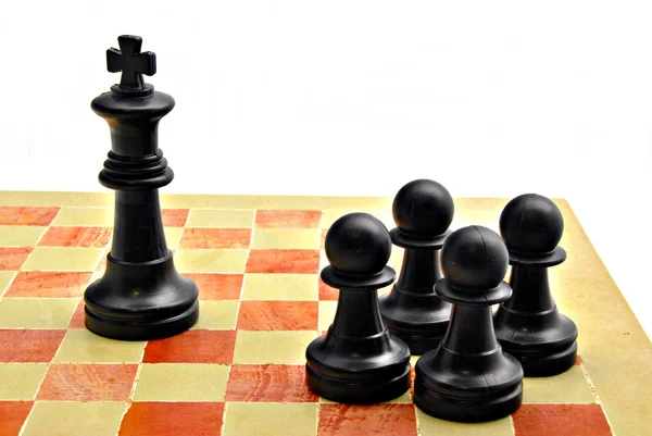 Four pawns black color — Stock Photo, Image