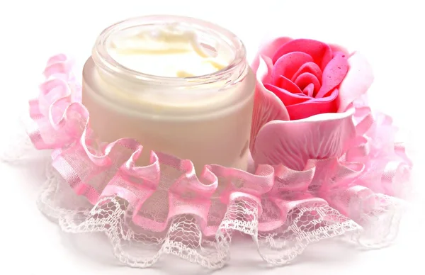 Vaso di crema con una rosa — Foto Stock