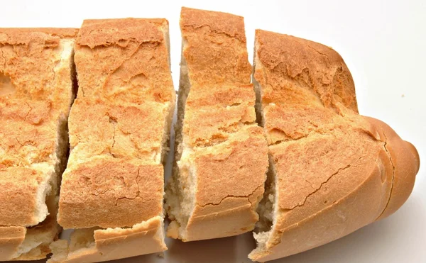 Ekmek parçalarını kesmek — Stok fotoğraf