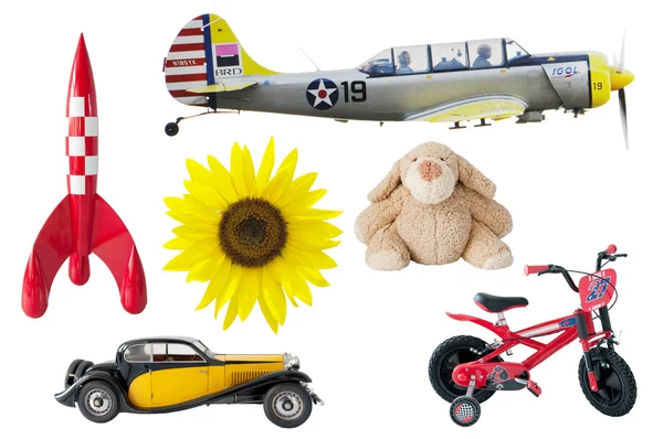 Мальчики игрушки - ракета, медведь, автомобиль, велосипед, самолет, подсолнух — стоковое фото