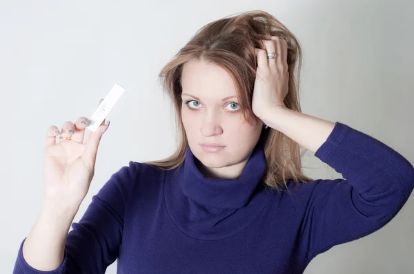 stock image The girl with the test for pregnancy