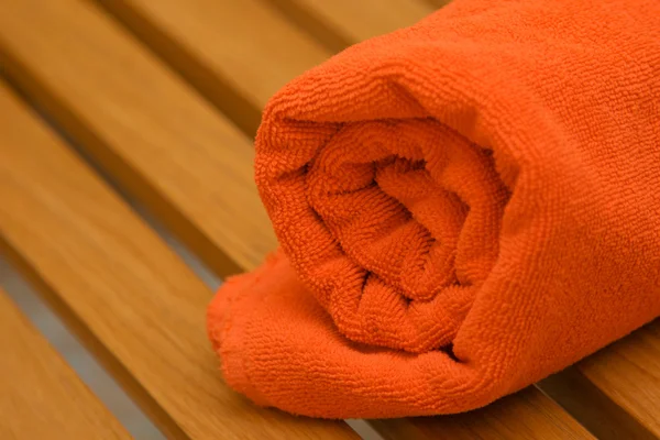 Плетеное оранжевое полотенце — стоковое фото