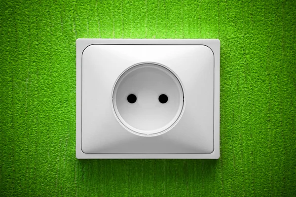 The socket in a green wall — Stock Photo, Image