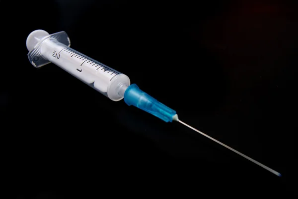 Medical Syringe On Black Background — Stock Photo, Image