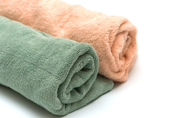Two towels braided on the white — Stock Photo, Image