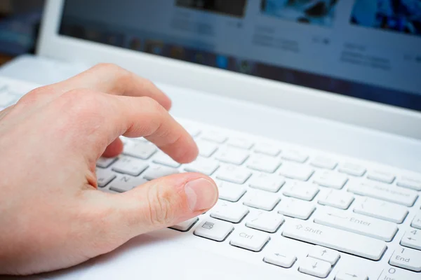 Hand typing on keyboard — Stock Photo, Image