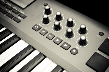 Synthesizer keyboard and controls clipart
