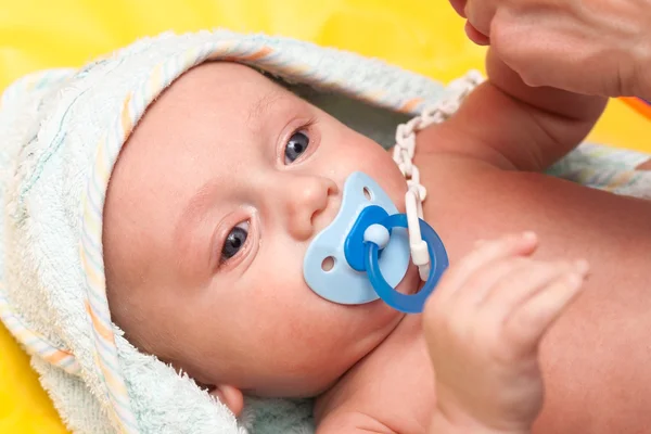 Baby with soother (baby's dummy) — Stock Photo, Image