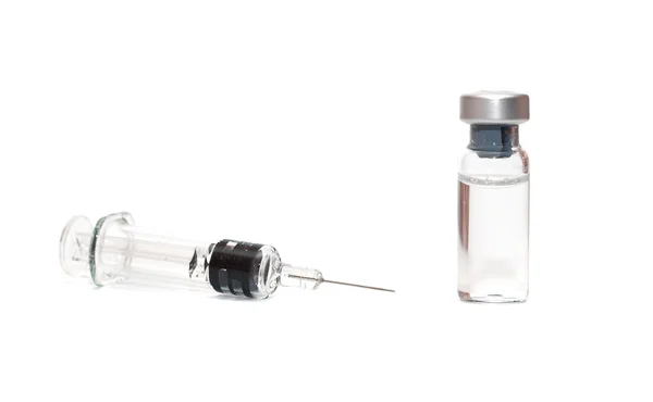 Syringe and vials on white Stock Picture