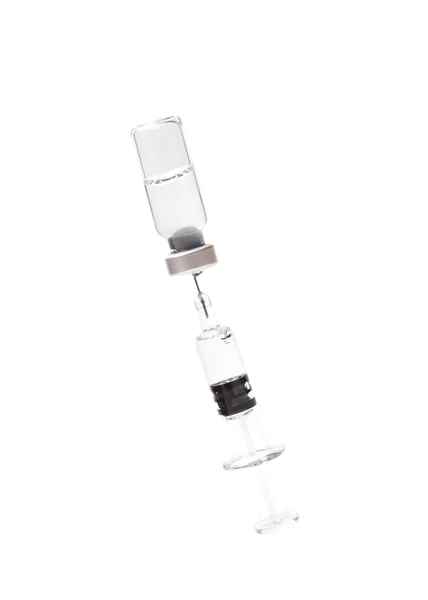 Syringe and vials on white — Stock Photo, Image