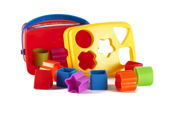 Bloques de juguete y formas sobre un fondo blanco — Foto de Stock