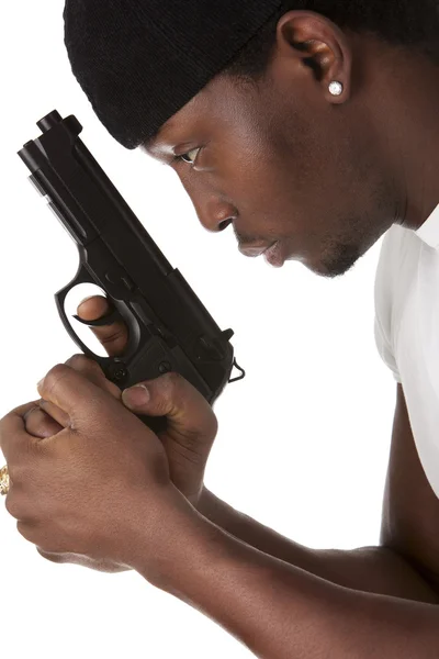Mladý lupič s pistolí — Stock fotografie
