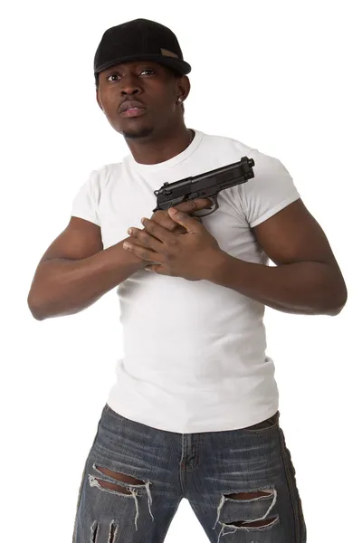 Mladý lupič s pistolí — Stock fotografie