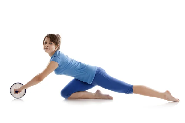 Meisje met een gymnastiek roller — Stockfoto