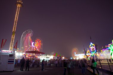 Carnival Rides and Games at Night clipart