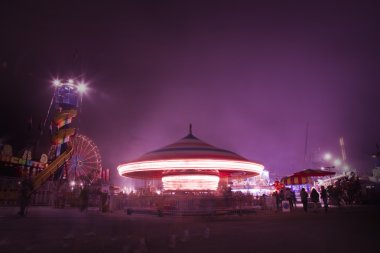 Carnival Rides and Games at Night clipart