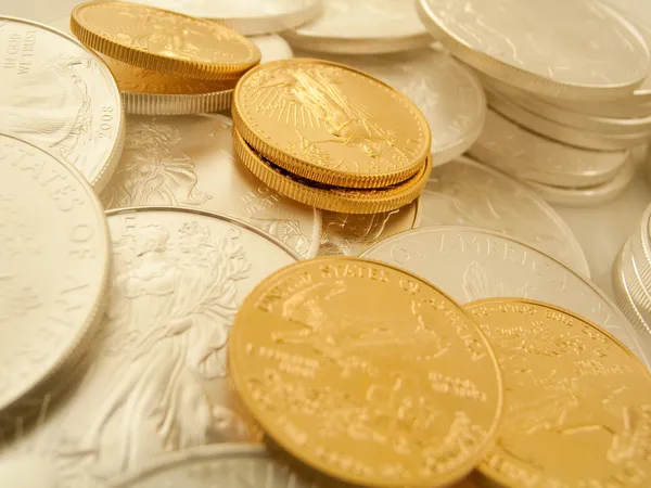 Zlatých a stříbrných prutů mince USA Royalty Free Stock Fotografie
