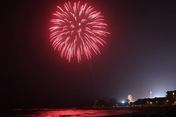 Feuerwerk beim Strandkarneval Stockbild