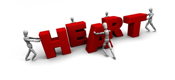 Team of Pushing Together the Word HEART — Stock Photo, Image