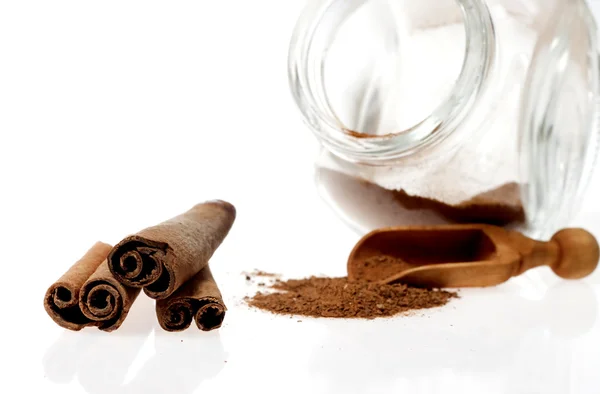 Cinnamon - three sticks and powder — Stock Photo, Image