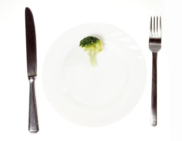 Plaka üzerinde küçük brokoli — Stok fotoğraf