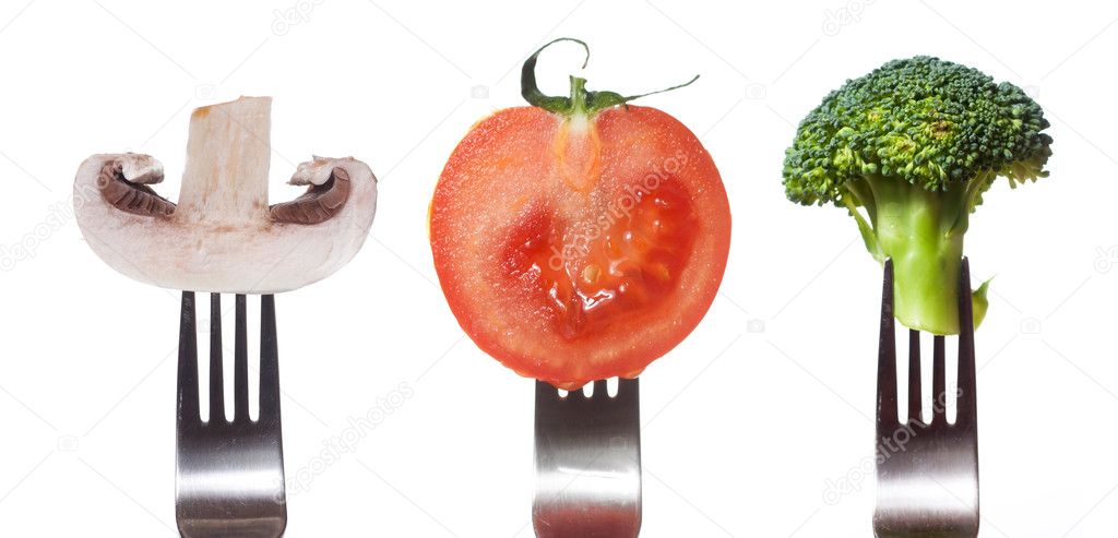 Vegetables on the collection of forks, diet concept