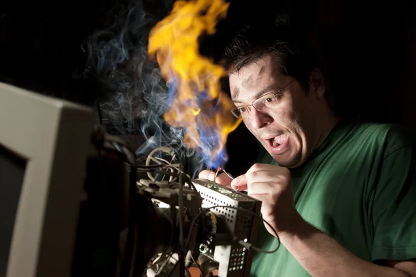 Funny electrician on fire — Stock Photo, Image