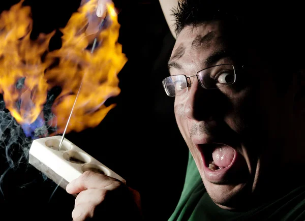 Funny electricista en llamas —  Fotos de Stock
