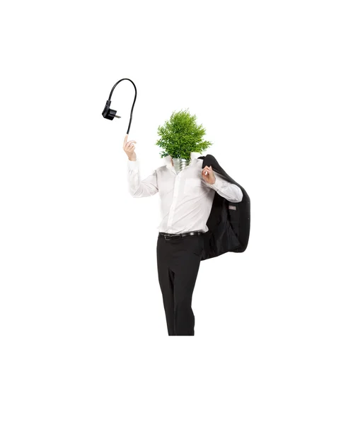 Wearingo άνθρωπος του κεφάλι λάμπα φωτός από ένα δέντρο που συμβολίζει την πράσινη ενέργεια — Φωτογραφία Αρχείου
