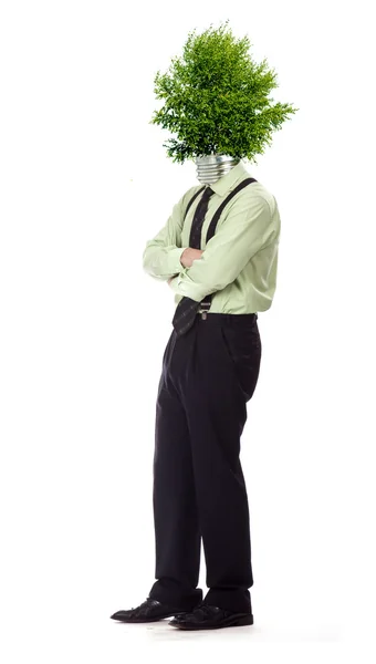 Man wearingo his head light bulb made of a tree symbolizing green energy — Stock Photo, Image