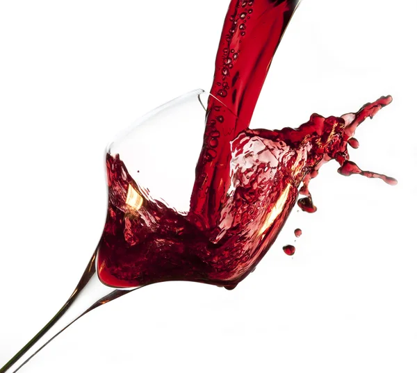 stock image Pouring red wine