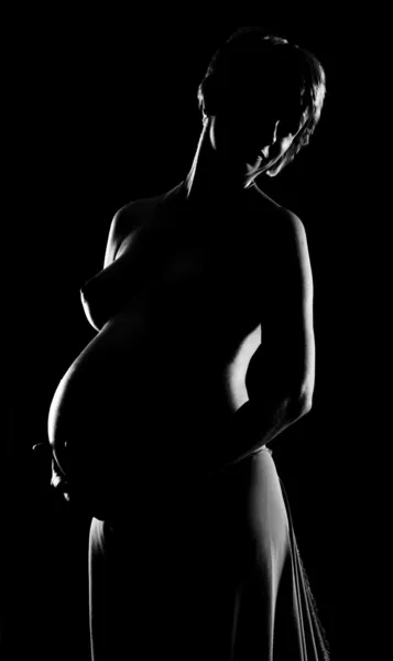 Pregnant woman silhouette in black and white — Stock Photo, Image