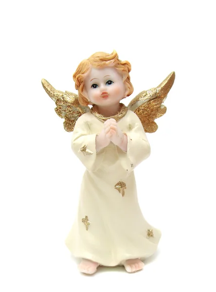 Ангел с золотыми крыльями, статуэтка. Ангел-хранитель Стоковое Фото