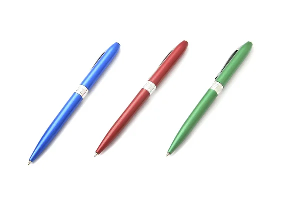 Drei Kugelschreiber auf weißem Hintergrund Stockbild