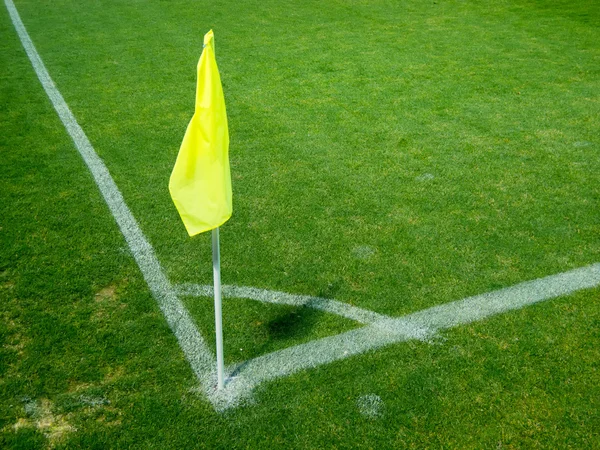 Flaga w rogu stadionu piłkarskiego — Zdjęcie stockowe