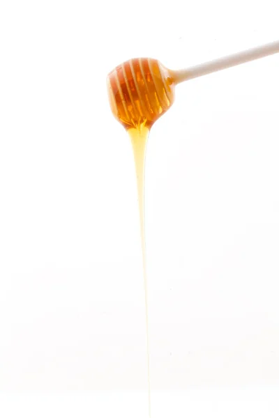 蜂蜜在一碗中运行 — 图库照片