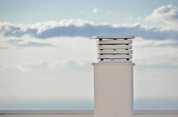 White chimney with blue sky background. — Stock Photo, Image