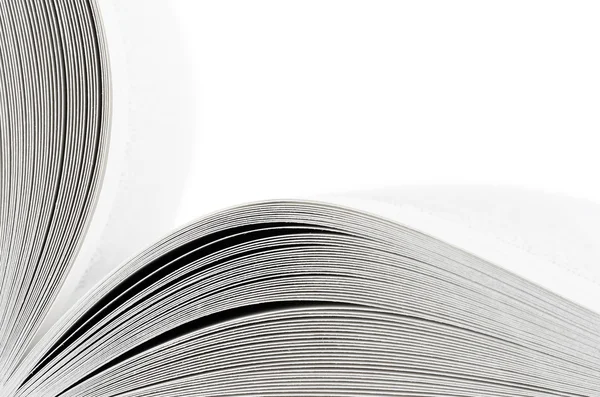 stock image Macro of opened book on white background