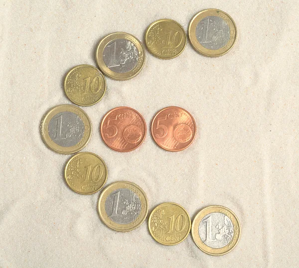 Símbolo do euro com moedas de euro — Fotografia de Stock