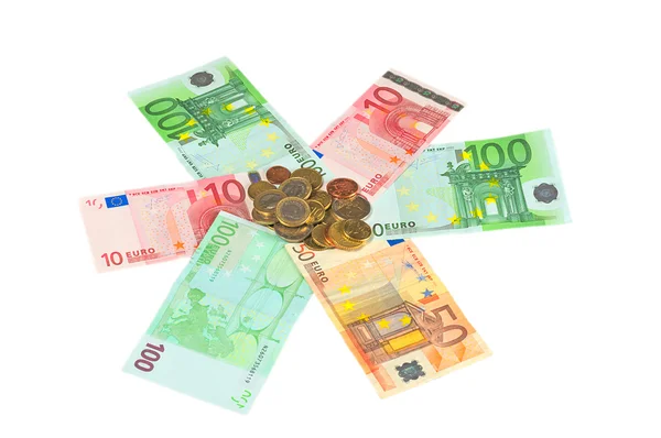 Много банкнот и монет евро — стоковое фото