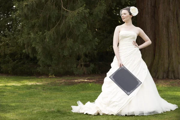 Bride and blank board — Stock Photo, Image
