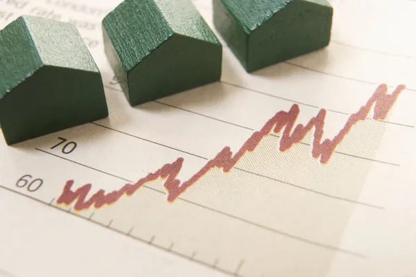 Graph with houses Stock Picture