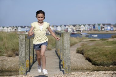 Young girl enjoying the summer clipart