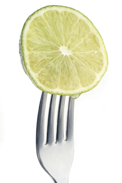 Lime on fork — Stock Photo, Image