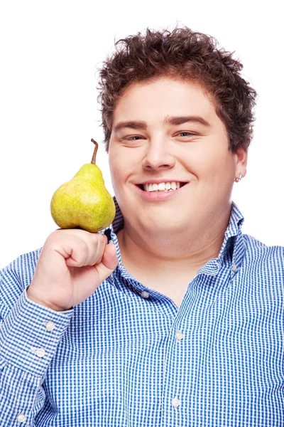 Chubby boy and pear — Stock Photo, Image